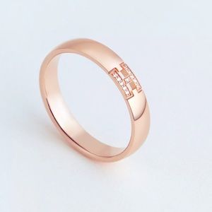 Used HERMES Ever Herakles wedding band. Amazing E color VS diamonds rose gold